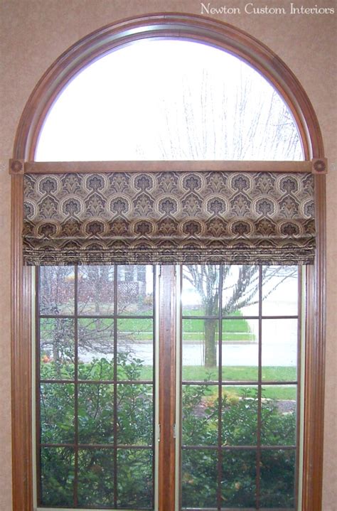 Whether hung on an arched rod or a straight rod, curtains make a natural window covering for arch windows. What To Do With An Arched Window? - Newton Custom Interiors