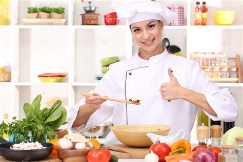 Young Woman Chef Cooking In Kitchen ⬇ Stock Photo Image By
