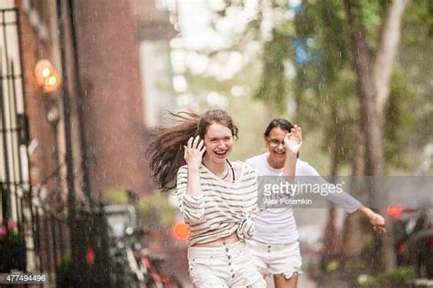 two girls taking shower together stockfoto s en beelden getty images