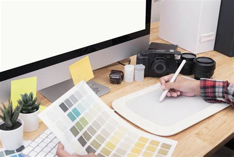 Graphic Designer Artist Using Graphics Tablet Drawing And Looking At