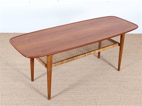Steeped in scandinavian style, this distinctive coffee table is sure to spark conversation as it offers a spot to set down snacks, magazines, and more. Mid-Century Modern Scandinavian Coffee Table in Teak and ...