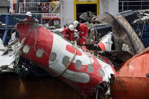 Airasia Flight Qz8501 Bleached Bones Found In Recovered Fuselage Wreckage