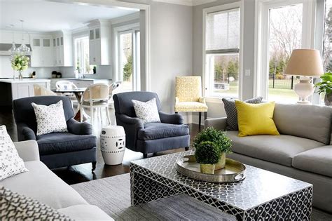 Gray Sofa With Bright Yellow Pillows And Black Waterfall
