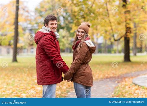 Happy Young Couple Walking In Autumn Park Stock Image Image Of Nice