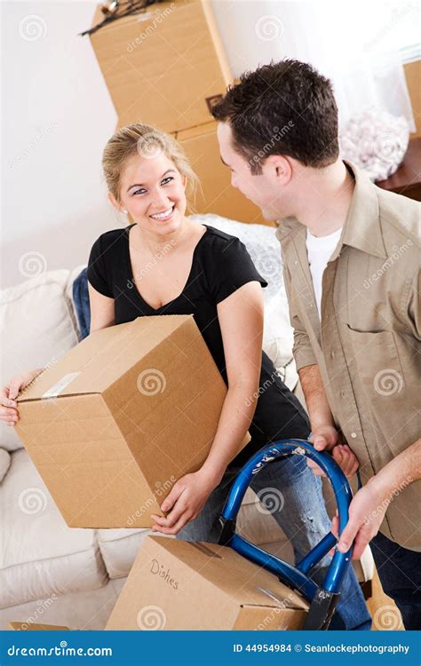 Moving Couple Moving Boxes Out Of House Stock Photo Image Of Male