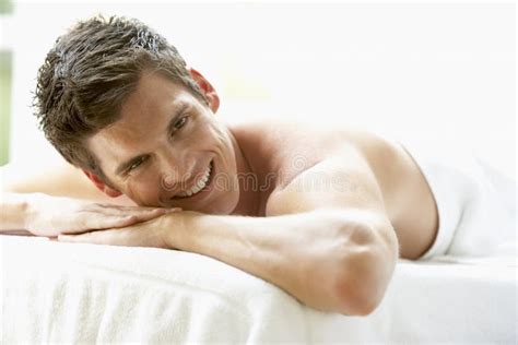 Young Man Relaxing On Massage Table Stock Image Image Of Treatment