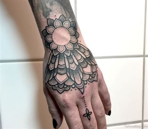 50 Great Looking Mandala Tattoos On Hand Tattoo Designs