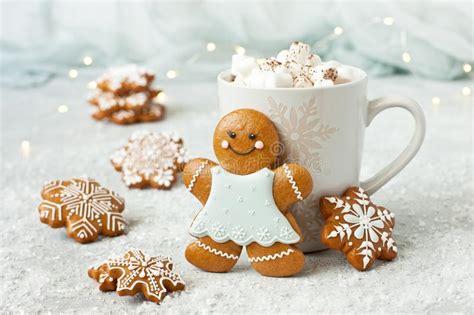 Mug Filled With Hot Chocolate Marshmallows And Gingerbread Cookies