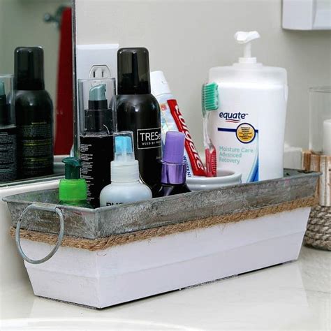These best bathroom organization ideas will get your washroom tidy in no time, from fresh rack and shelving ideas to drawer organizers and more. Make A Pretty Bathroom Counter Organizer - Petticoat Junktion