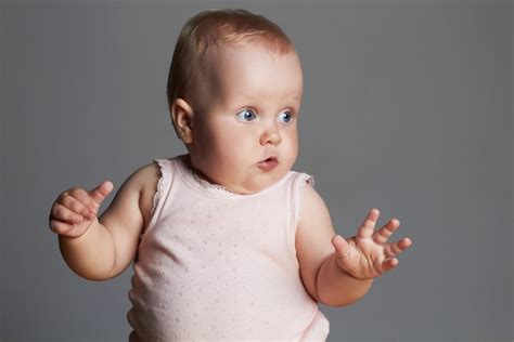4k Gray Background Infants Hands Glance Singlet Hd Wallpaper