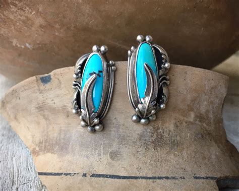 Traditional Navajo Turquoise Earrings With Sterling Silver Feather