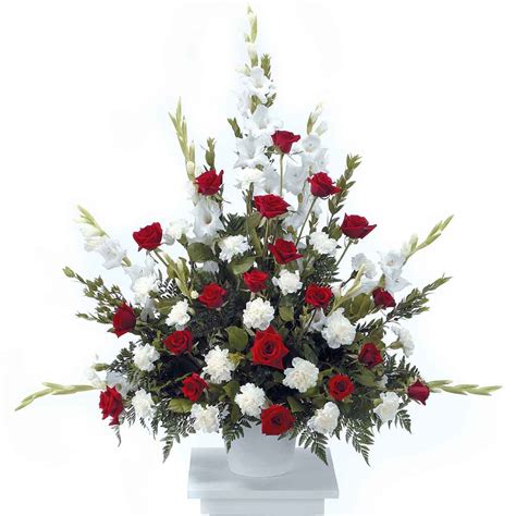 Ital florist's soul's splendour arrangement is a rich display of the love shared throughout the life of the deceased. Classic Red & White Funeral Arrangement | Flowers | Disney ...