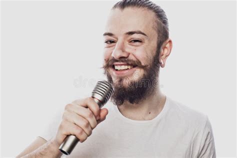 Boy Rocking Out Image Of A Handsome Bearded Man Singing To The Microphone Stock Photo Image