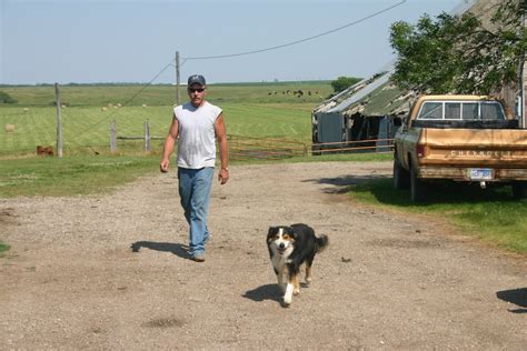 The Elkton Farmers Farmer And His Dog