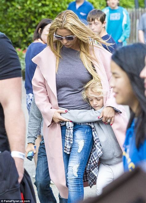 Katie Price Enjoys Day At A Theme Park With Sons Harvey