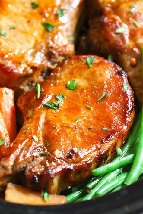 Closeup Of Slow Cooker Pork Chops Made With Bone In Rib Chops And A