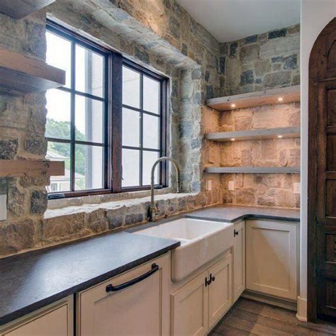 Again, the veneer must be cut to make sure it's flat with the edge of the cabinet and that simple cutting produces the same identical pattern, an aspect that is very suitable for kitchen cabinets. Top 60 Best Kitchen Stone Backsplash Ideas - Interior ...