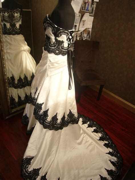 Circular skirt has satin underskirt and several layers. Stunning Gothic Black and White Wedding Dress converts to reception dress Custom Made to your ...