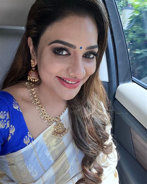 Singer Rimi Tomy Looks Gorgeous In Kerala Saree Onam Special Photos Hot Sex Picture