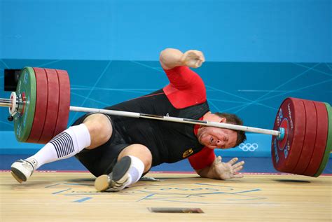 Iranian Weight Lifter Wins Gold In Mens Super Heavyweight Division