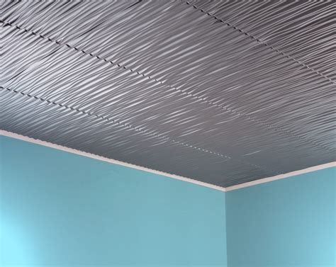 Simply paint suspended grid system to match tile color. 2x2 Drop Ceiling Tiles | NeilTortorella.com