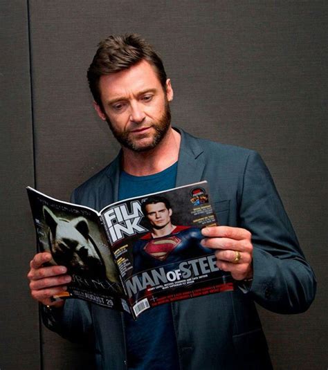 Hugh Jackman Reading A Magazine With Henry Cavill On The Cover Too