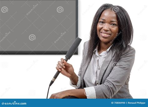 Young African American Journalist With A Microphone Stock Photo Image