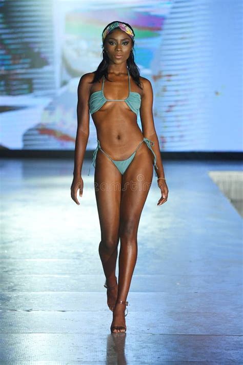 A Model Walks The Runway For Almost Naked Swim Show Editorial Stock Photo Image Of Collection