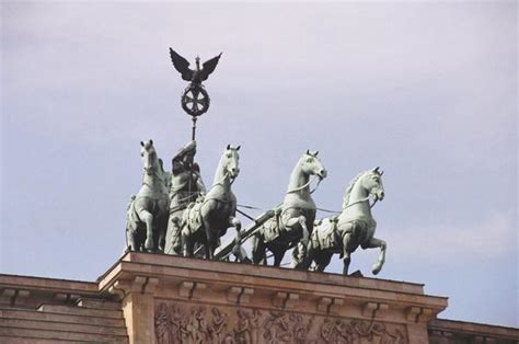 Ever since the brandenburg gate was built it has become a symbol of the city. Horses on top of Brandenburg Gate, Berlin, Germany | Photo