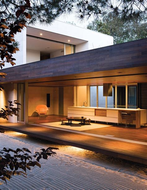 A Modern House Is Lit Up At Night
