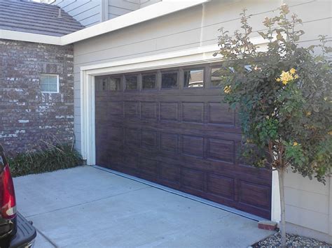 Happy is a home that shelters a friend. Services | UnReal Garage Doors
