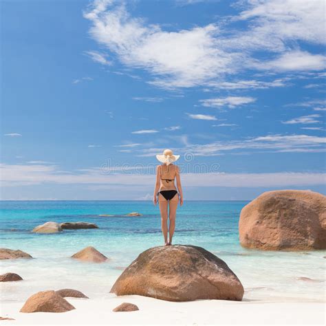 Woman Enjoying Anse Lazio Picture Perfect Beach On Praslin Island