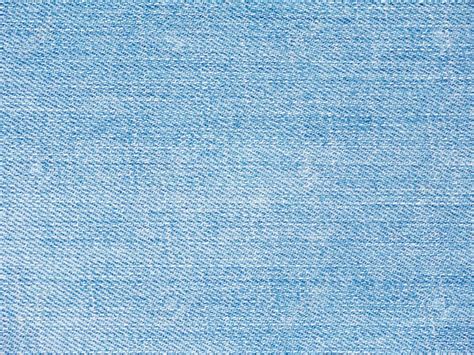 Light Blue Washed Faded Denim Fabric Texture Swatch Stock Photo