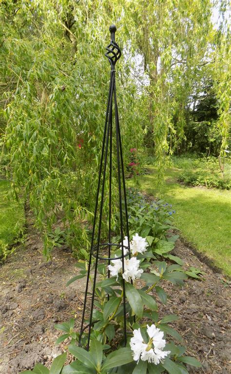 Plant supports uk has a vast range of products to help protect plants, planting schemes and borders and show plants and flowers. Finial Metal Obelisk - Climbing Plant Garden Support ...