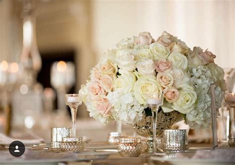 Roses And Hydrangea Low Centerpiece In Blush And Ivory Silver Urn Low