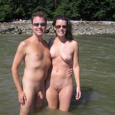 Happy Naked Couple On A Beach With Guy S Pierced Semi Hard Hairy Cock