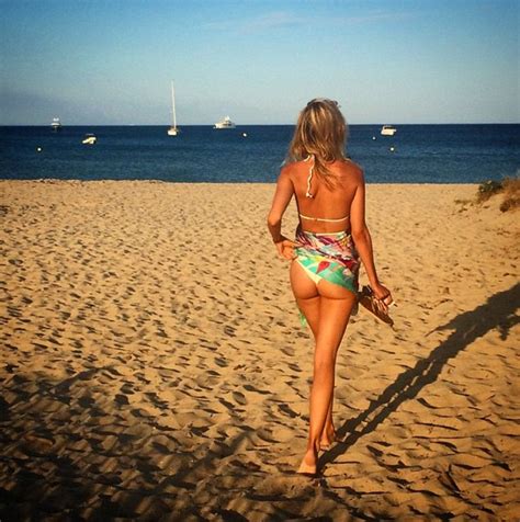 Kimberley Garner Gives A Cheeky Glimpse Of Her Pert Posterior In St