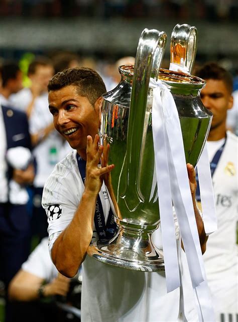 Cristiano Ronaldo Of Real Madrid Celebrates With The Champions League