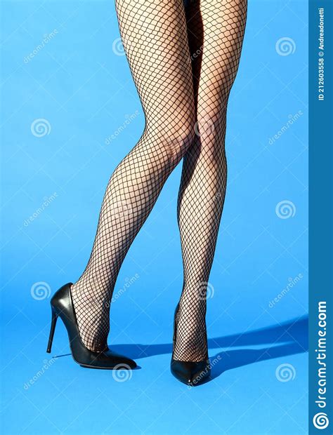 Woman Wearing Black Fishnets And Stiletto Shoes Stock Photo Image Of