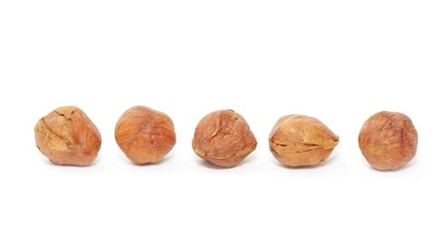 Premium Photo Hazelnuts Isolated On White Background