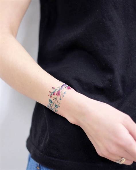 Flower Wristlet Wrist Band Tattoo Flower Wrist Tattoos Tattoos For