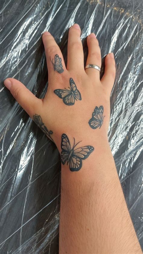 Butterfly Hand Tattoo Butterfly Hand Tattoo Hand Tattoos Butterfly