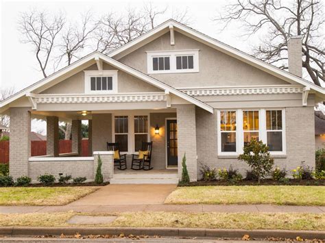 Painted Brick Bungalow Style House With White Dentil Moulding