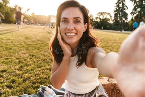 Photo Of Middle Aged Woman 30s Using Laptop While Lying In Bed With