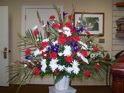Mason jar of blue flowers, blue flowers in jar with green foliage, bouquet of blue flowers an any occasion card: 1-6-TX Red, White, and Blue Traditional Basket | Blumen Luneas