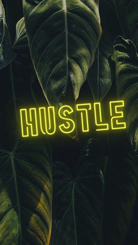 The Word Hustle Is Surrounded By Large Green Leafy Plants And Dark Sky