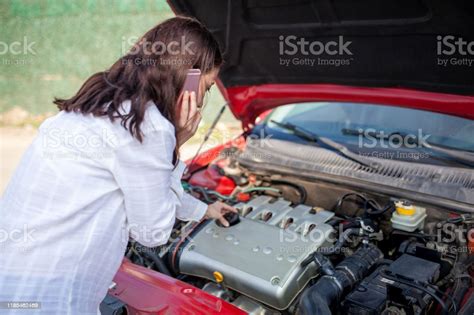 Woman Calls Asking For Help When The Car Break Down Stock Photo