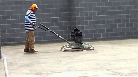 Finished concrete structures using trowels, floats, straight edges, joiners, and. The concrete finishers doing a nice slick job. - YouTube