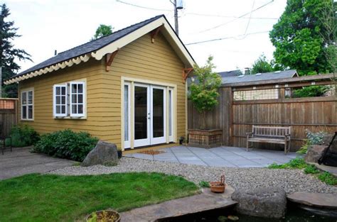Give your dull yard a fun carnival feel using this backyard mini gold set. Summerfield Tiny Cottage by Cali Cottages