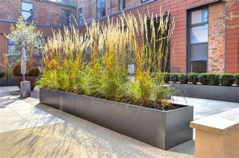 7 Metal Planters Award Winning Contemporary Concrete Planters And